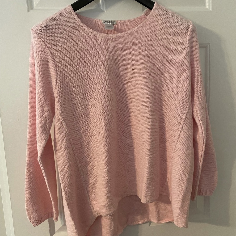 Pink sweater. Gently worn. Tag says one size.